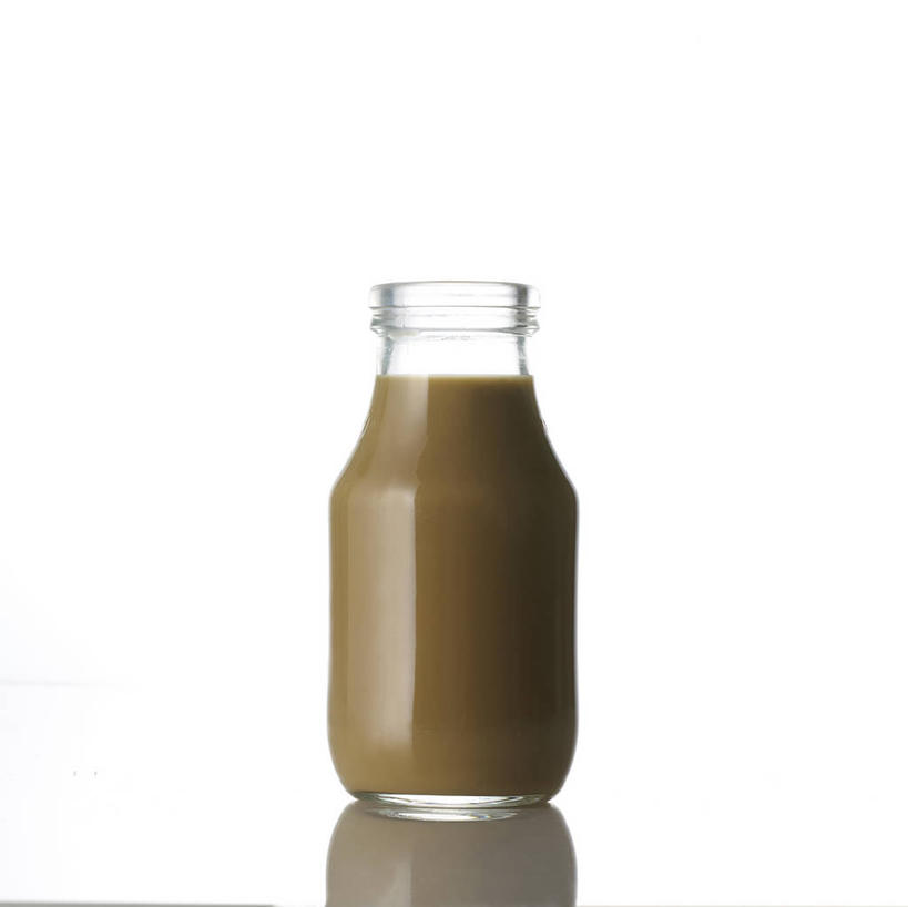 咖啡,牛奶,无人,横图,室内,特写,白天,白色背景,正面,幸福,桌面,桌子,阴影,反射,影子,饮品,营养,娱乐,玻璃制品,饮料,一个,倒影,玻璃瓶,瓶子,享受,休闲,温馨,放松,乐趣,摄影,影棚,单个,倒映,一瓶,提神,乳制品,舒适,奶,牛乳,醒脑,软饮料,安神,反照,彩图,影棚拍摄,拍摄,牛奶咖啡